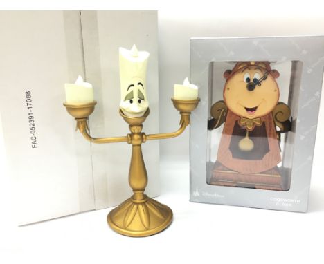 Disney Beauty and the Beast boxed Cogsworth Disney Parks exclusive clock and a Lumiere light up figure