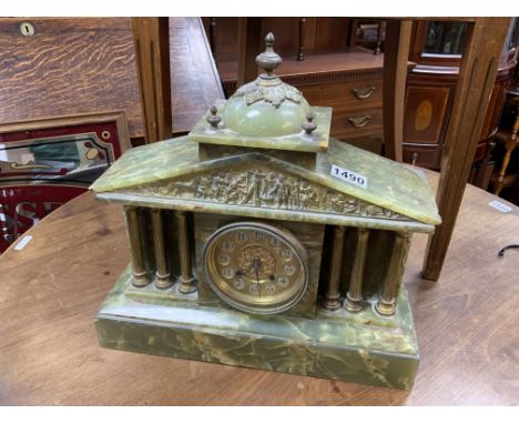 An Onyx and brass classical style mantle clock. Postage not available for this lot.