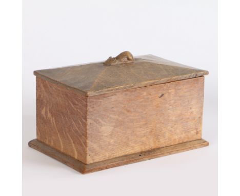 Robert 'Mouseman' Thompson (1876-1955). an oak tea caddy.&nbsp;The oak tea caddy with signature carved mouse to the lid, 14cm