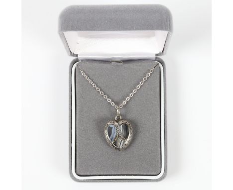 Late Victorian Scottish Montrose agate heart pendant with chain.&nbsp;A heart shaped pendant set with three agate pieces surr