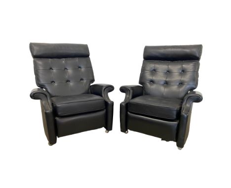 The pair of Parker Knoll N 30 reclining armchairs with black faux leather upholstery and button back/ seat, 102cm height, 88c