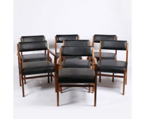 R. Foster &amp; Son. a set of seven teak office chairs. Including five standard and two elbow chairs, the teak and faux leath