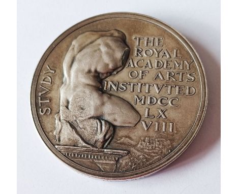 SILVER ROYAL ACADEMY OF ARTS MEDAL 1910 - AWARDED TO EDMUND THOS. WYATT WARE FOR A MODEL OF A DESIGN CONTAINING FIGURE &amp; 