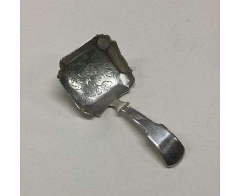 A square bowl silver caddy spoon. London 1817. Approx. 10 grams. Est. £30 - £50.