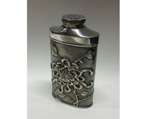 A Chinese export silver powder flask. Marked to base. Approx. 131 grams. Est. £250 - £300.