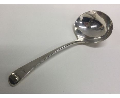 A Georgian silver sauce ladle. London. By GS. Approx. 46 grams. Est. £20 - £30.