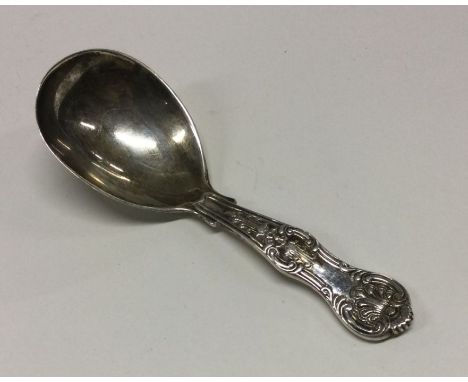 A Victorian silver Kings' pattern caddy spoon. London 1876. By George Adams. Approx. 30 grams. Est. £40 - £60.