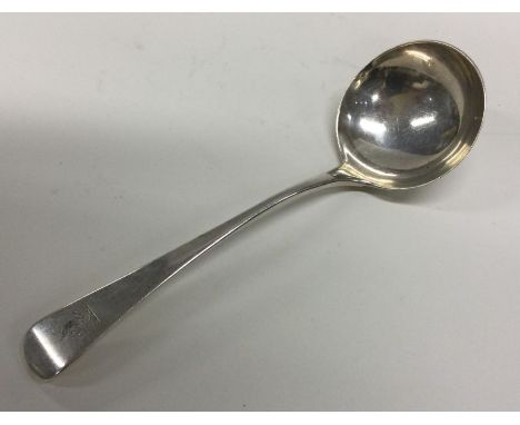 EXETER: A Georgian silver crested sauce ladle. By Richard Ferris. Approx. 48 grams. Est. £20 - £30.