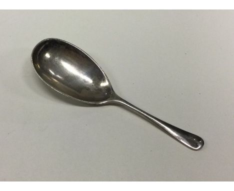 A silver caddy spoon. Sheffield 1918. By WS Savage &amp; Co. Approx. 14 grams. Est. £20 - £30.