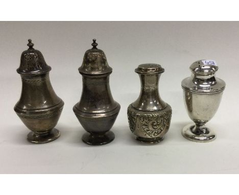 A good pair of heavy engine turned silver peppers with bright cut decoration etc. Approx. 194 grams. Est. £60 - £80.