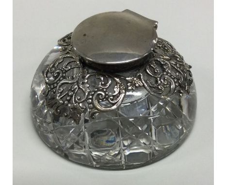A good silver and glass inkwell attractively decorated with flowers. London. Est. £50 - £80.
