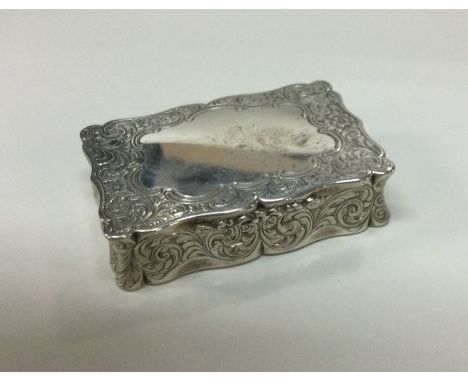 A decorative Victorian silver table snuff box. London 1856. By Edward Smith. Approx. 153 grams. Est. £400 - £500.