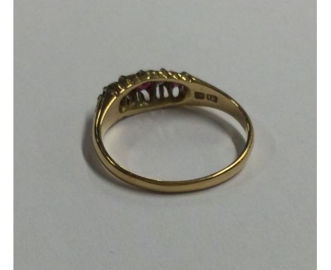 An Antique 18 carat ruby and diamond ring. Approx. 3 grams. Est. £120 - £150.