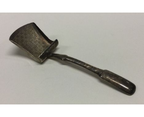 A George III silver caddy spoon with bright cut decoration. Birmingham 1814. By William Pugh. Approx. 9 grams. Est. £60 - £80