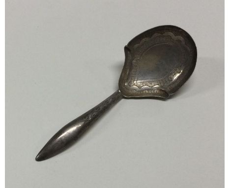 A George III silver caddy spoon. Birmingham 1812. By William Pugh. Approx. 7 grams. Est. £40 - £60.