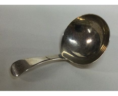 A Georgian silver OE pattern caddy spoons. London. By GS. Approx. 11 grams. Est. £20 - £30.