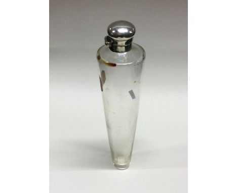 A silver mounted glass hunting flask. Birmingham 1888. Est. £140 - £160.