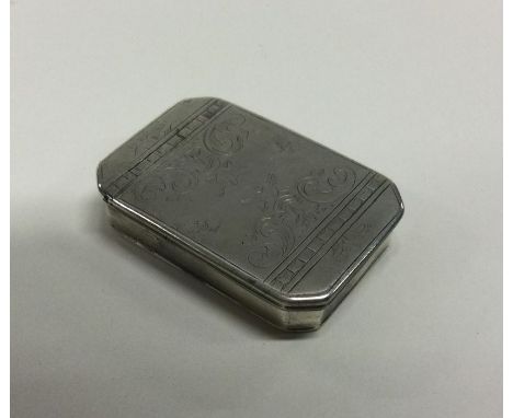 An early 18th Century silver hinged snuff box with engraved decoration. Maker's mark only. Circa 1720. Approx. 31 grams. Est.