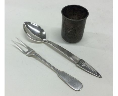 A Russian silver vodka tot dated 1894, together with an oyster fork and Moscow space rocket spoon. Approx. 65 grams. Est. £40