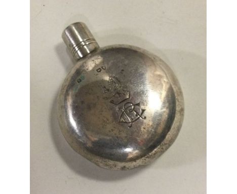 A Victorian silver flask with detachable cup. London 1876. By George Angel. Approx. 32 grams. Est. £60 - £80.