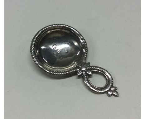 A George III silver caddy spoon with rope border. Birmingham 1800. By Samuel Pemberton. Approx. 7 grams. Est. £30 - £50.