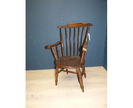 Victorian elm circular seated Windsor stick back arm chair