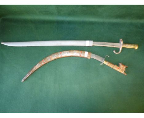 Military bayonet with brass handle & metal scabbard, and North African sword with inlaid wooden handle & scabbard