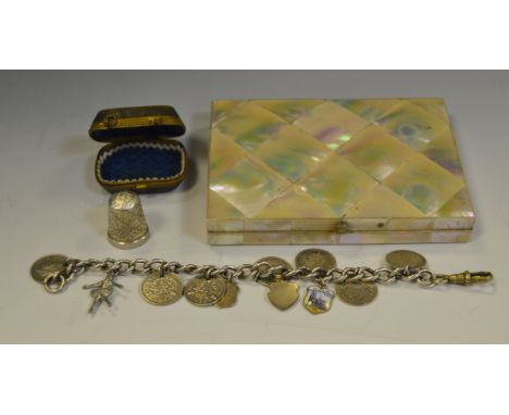 A silver thimble, cased;  a Victorian mother-of-pearl purse;  a silver Albert coin bracelet, 32g