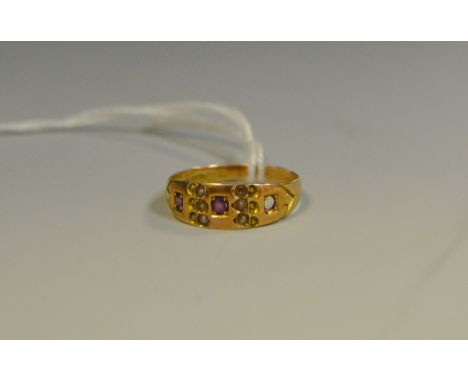 A Victorian 15ct gold seed pearl and garnet ring