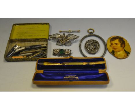 A 15ct gold bar brooch inset clear amethyst and seed pearl; six gold coloured fountain nibs others; a filigree silver brooch 