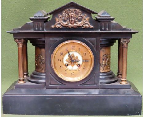 Vintage black slate mantle clock with gilt metal columns and brass dial, by Richardson, Paris. App. 36cm H x 43cm W x 18cm D 