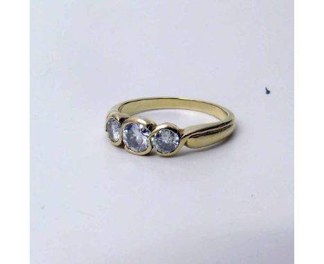 18ct gold three stone ring, 3.9g gross. Condition report: see terms and conditions.