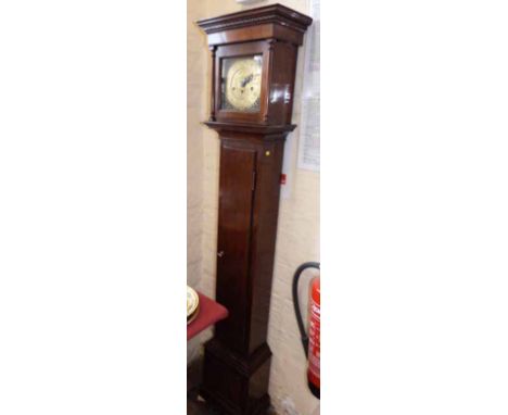 Westminster chime mahogany Grandmother clock with brass dial, pendulum and key. Condition report: see terms and conditions.