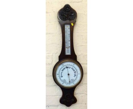 Oak mounted aneroid banjo barometer. Condition report: see terms and conditions.