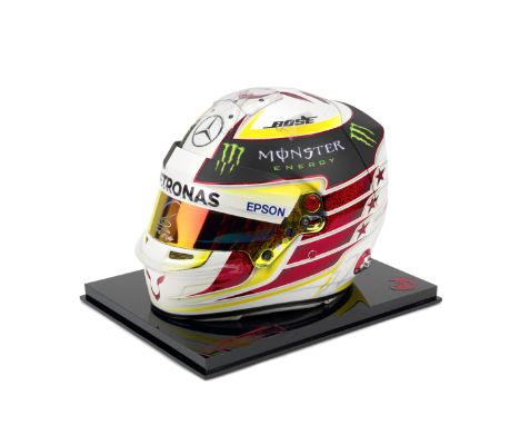 A Lewis Hamilton 2016 Monaco Grand Prix limited edition replica helmet by Bell,in white with red, yellow and black design, wi