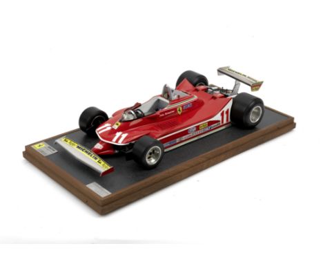 A 1:8 scale limited edition model of Jody Scheckter's 1979 Season F1 World Championship winning Ferrari 312 T4, by Amalgam,li