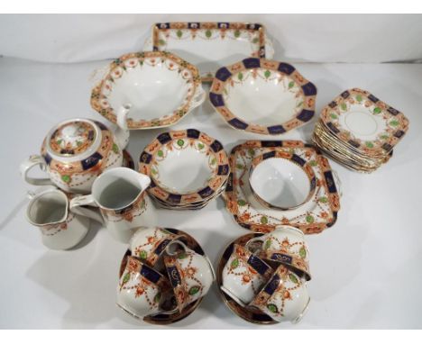 A Victorian part tea service by Burgess comprising 39 pieces plus one further ceramic bowl by J.M. & Co. (Devon)