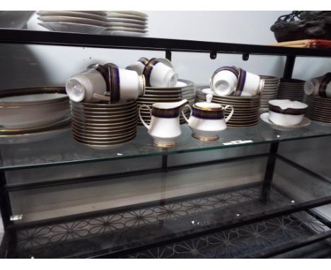 A good quality dinner service - Legacy by Noritake, comprising 92 pieces to include dinner plates, side plates, bowls, cups, 