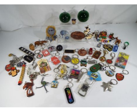 A good mixed lot to include two glass domed paperweights in the form of apples, two sets of miniature ceramic animals, in exc