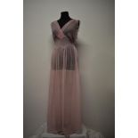 A floaty 1930s silk chiffon nightdress, in pale pink having delicate white floral pattern, cross