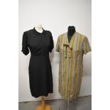 A vintage striped cotton day dress and a 1940s black crepe dress.