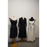 A 1950s charcoal grey with metallic thread day dress, having ruffled white collar, a 1940s/50s black