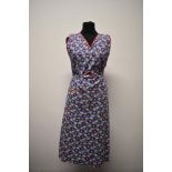 A 1940s floral overall / pinafore.