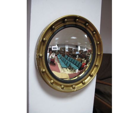An Atsonea Wall Mirror, with gilt bauble surround.