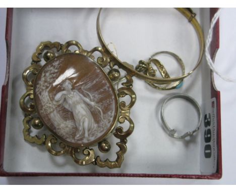 A XIX Century Oval Shell Carved Cameo, depicting female with bow beside a tree, collet set within shaped openwork border; tog