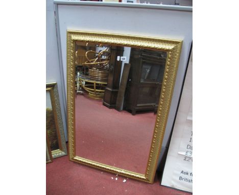 A Rectangular Bevelled Wall Mirror, in gilt frame.