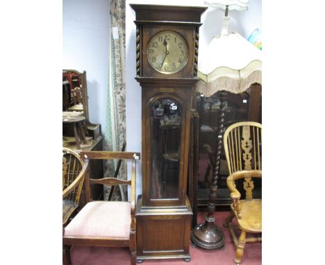 A 1920's Oak Cased Twin Weight Driven Grandfather Clock, brass dial, Arabic numerals, the hood with plain cornice and barley 