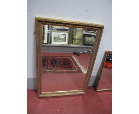 A Rectangular Bevelled Wall Mirror, in moulded gilt frame, 59 x 90cm.