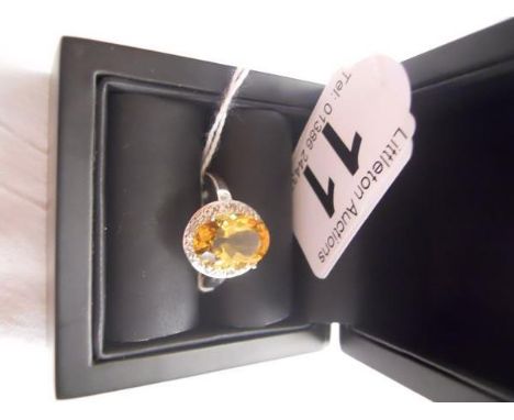 White gold citrine and diamond set ring - Estimate £150 to £220