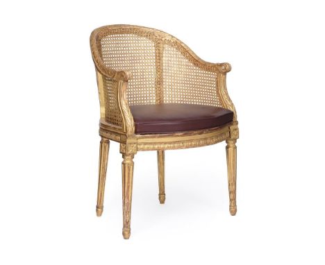 A LOUIS XVI CARVED GILTWOOD FAUTEUIL DE BUREAU OR ARMCHAIRATTRIBUTED TO NICOLAS-LOUIS MARIETTE, CIRCA 1775-80Stamped indistin